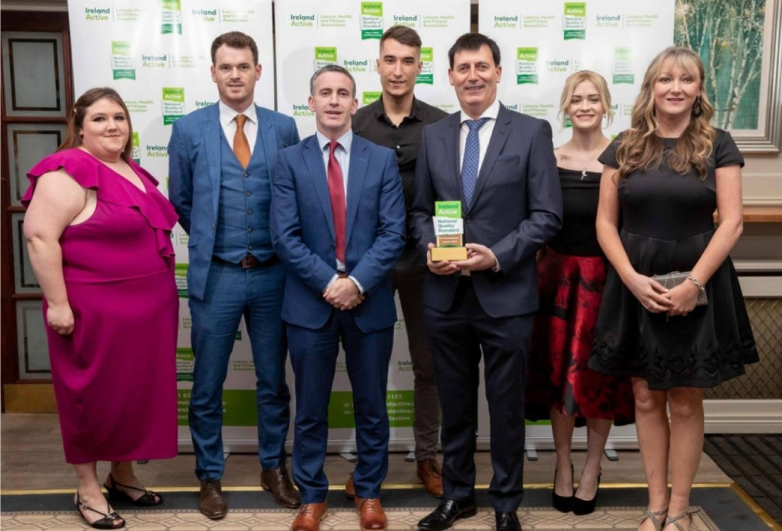 Aura Navan staff pictured with Minister Damien English